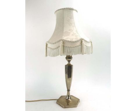 A silver table lamp base of canted form, makers mark indistinct, Sheffield 1927, overall height inc. shade 65 cm, loaded COND