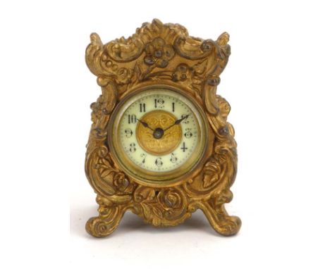 An Edwardian bracket clock, the silvered dial with silent/chime and regulator dials in a moulded mahogany case of lancet shap