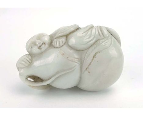 A Chinese white jade carving modelled as a figure climbing a gourd, a lingzhi mushroom to the reverse, l. 7 cm