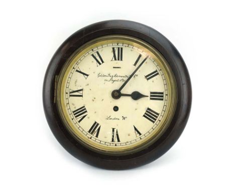 A 19th century wall clock with a later painted dial within a mahogany circular case, d. 28 cm CONDITION REPORT: Working order