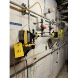 Qty. (2) LMI Metering Units, Rigging & Loading Fee: $75
