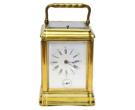 Carriage clock Carriage clock, two train 8-day movement striking on single gone, repeater and alarm, self-compensating balanc