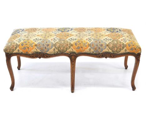 French upholstered long stool Early 20th-century French long stool, upholstered seat with tapestry covers, beech frame, six s