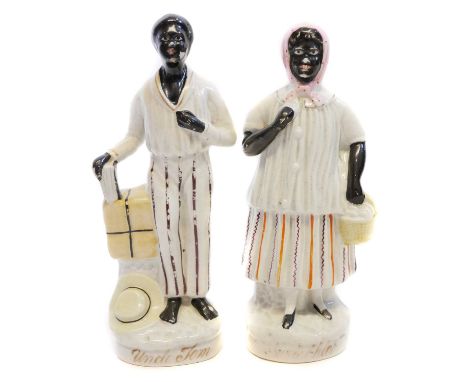 Staffordshire figures of Uncle Tom and Aunt Chloe. Staffordshire figures of Uncle Tom and Aunt Chloe, mid 19th century.22cm h