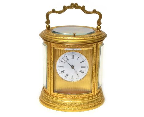 Late 19th-century gilded brass carriage clock Late 19th-century gilded brass carriage clock, two train 8-day movement strikin