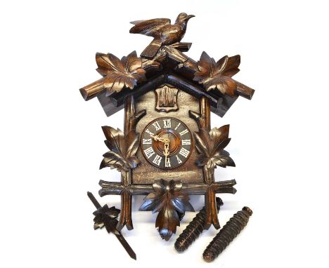 Early 20th-century black forest cuckoo clock Early 20th-century black forest cuckoo clock, traditional form decorated with ca