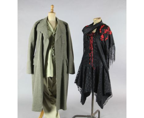 Centerentola and Carmen: A rail of silver and gold thread embroidered multi-coloured costume bodices, striped waistcoats, bon