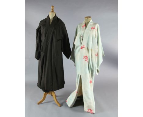 Madame Butterfly: A rail of eleven short multi-coloured woven and printed kimono jackets and twelve full length kimonos in cr