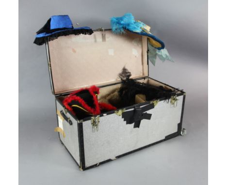Don Giovanni: A trunk containing two wigs, two footman's wigs, various hats and masks and feathers