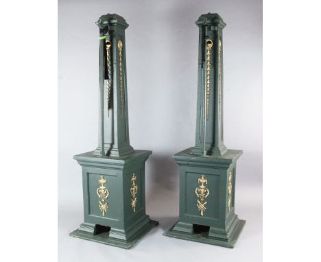 Four large bottle green and gilt painted square based lighting pillars specially made to mount electric spotlights