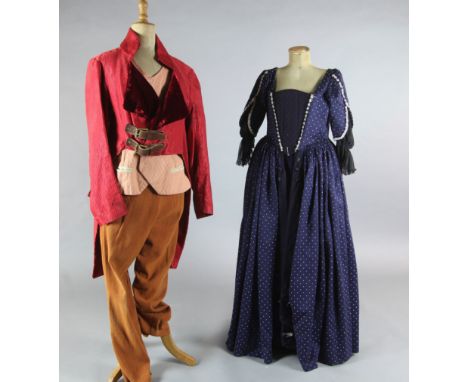 The Barber of Seville: a quantity of harlequin balloon pants, waistcoats, orange and red dresses and wool coats. Approx. 44 i