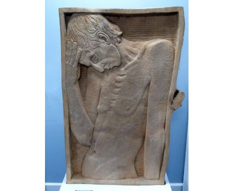 IAN THOMPSON (b.1937) SCULPTURE CARVED FROM A SINGLE SLAB OF ELM 'Captive Man Adam', half length, profiled portrait of a male