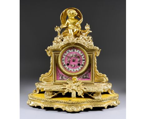 A Late 19th Century French Gilt Brass and Pink Porcelain Mounted Mantel Clock, by Ch. Vigne, No. 8064, the 3.25ins diameter p