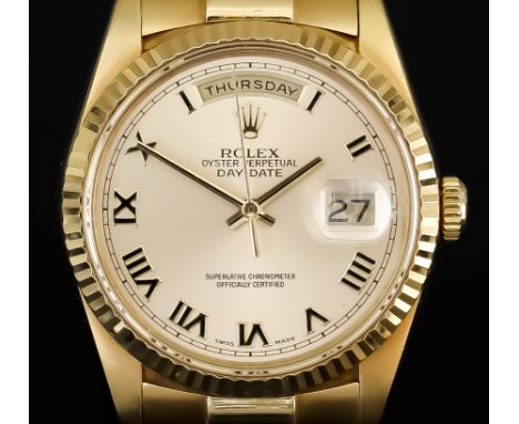 A Rolex Oyster Perpetual "Day-Date" Chronometer Automatic Wristwatch, 1994, 18ct Gold Cased, Serial No. E298072, the champagn