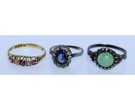Three Gem Set Rings, one 18ct gold set with two small diamonds and three small rubies, size P, one 9ct gold set with blue sto