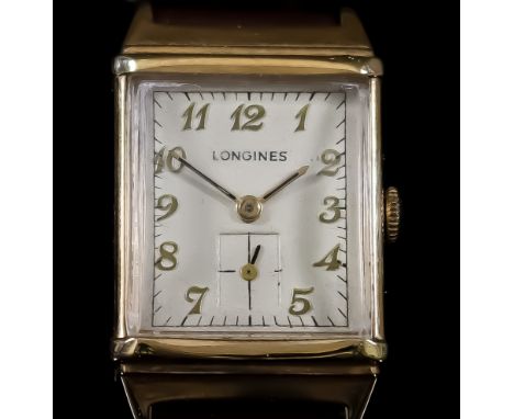 A Longines Wristwatch, 14ct Gold Cased, the cream dial with gold Arabic baton numerals with subsidiary seconds dial, manual w