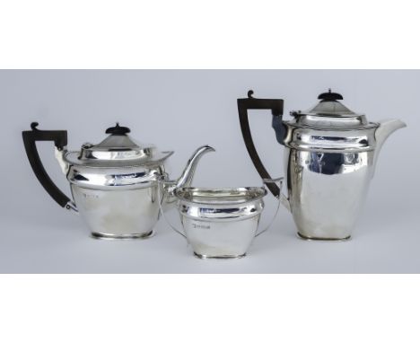 A George VI Silver Rectangular Three-Piece Part Tea Service, by Martin, Hall &amp; Co, Birmingham 1946, with reeded mounts, t