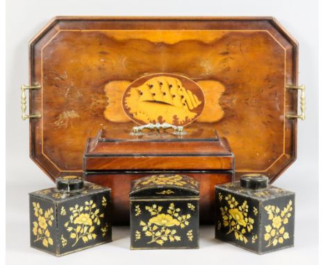 An early George III Mahogany Rectangular Tea Caddy, the incurved lid with ebonised mouldings and star pattern inlay to top, c
