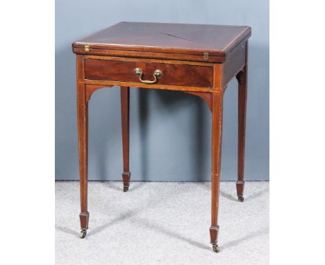 An Edwardian Mahogany Square Envelope Card Table, inlaid with satinwood bandings and boxwood stringings, the top opening to r