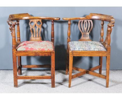 Two 18th Century Elm Corner Chairs, with low horseshoe pattern backs, each with twin fretted vase pattern splats, the drop-in