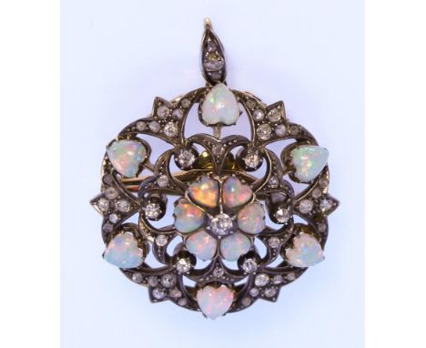 An Opal and Diamond Pendant at Will, in white and gold coloured metal mount, set with twelve small heart shaped opals in inte