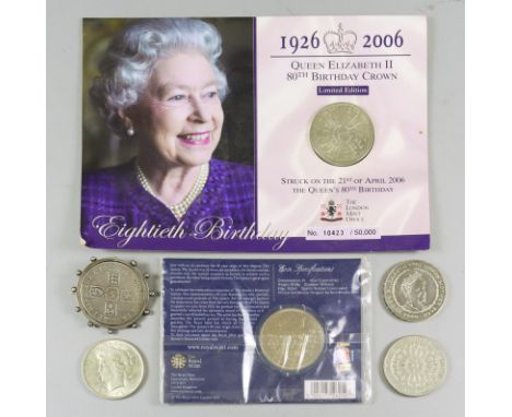 A William III 1696 Crown, fair, mounted in silver brooch, a USA 1922 silver dollar, four modern Elizabeth II five pound coins