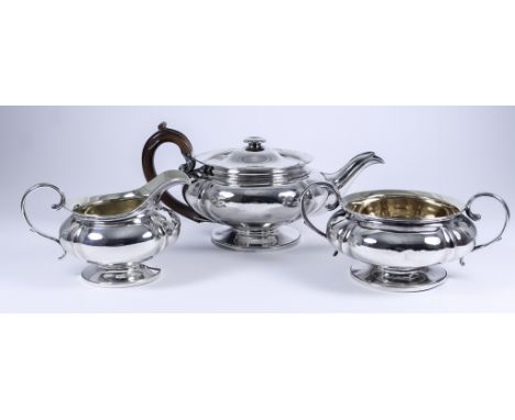 A George IV Silver Circular Three-Piece Tea Service, by William Eley &amp; Charles Price, London 1827, of circular squat lobe