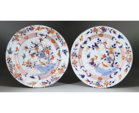 A Pair of Chinese Porcelain Chargers, Xianlong period, decorated in orange, blue and gilt in the "Imari" manner, with an exot