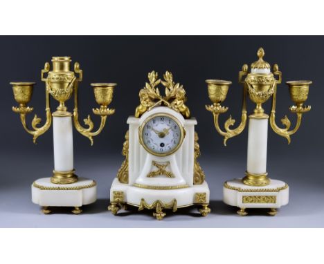 A Late 19th/Early 20th Century French White Marble and Gilt Brass Mounted Three-Piece Clock Garniture, the clock with 2.25ins