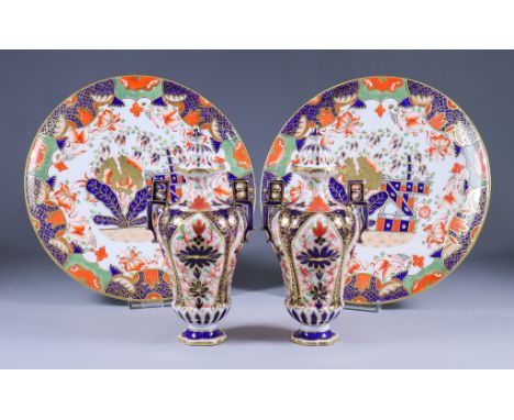 A Pair of Derby Bone China Two-Handled Vases and Covers, Late 19th Century, painted in Imari style, 7.75ins high, and a pair 