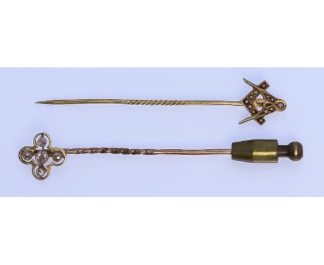 Two Gem Set Stick Pins, 20th Century, one depicting a Masonic symbol set with seed pearls, the other set with five small whit