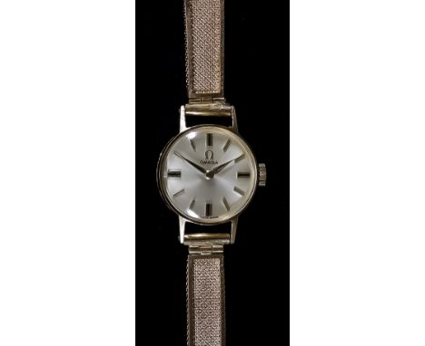 A Lady's Omega Cocktail Wristwatch, 9ct Gold Cased, the silvered dial with gold baton numerals, 17mm diameter, manual wind, w