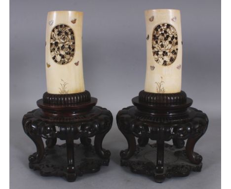 A PAIR OF FINE QUALITY JAPANESE MEIJI PERIOD MOTHER-OF-PEARL ONLAID IVORY TUSK VASES, with fitted carved wood stands, each va