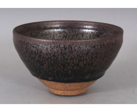 A CHINESE SONG STYLE JUN WARE OIL SPOT CERAMIC BOWL, the glaze falling well short of the foot, 5in diameter & 2.9in high.