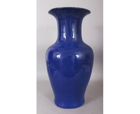 A LARGE CHINESE BLUE GLAZED BALUSTER CERAMIC VASE, the base unglazed, 19.9in high.