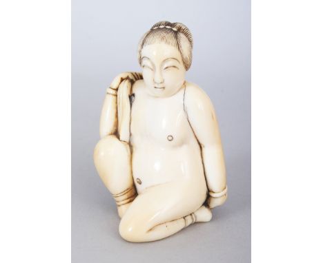 AN UNUSUAL GOOD QUALITY 18TH CENTURY CHINESE CARVED IVORY FIGURE OF A KNEELING NAKED LADY, converted to a netsuke, her hair e