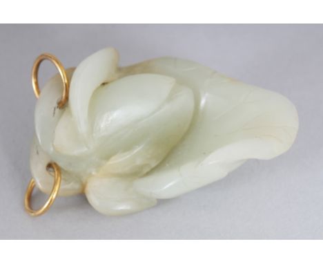 A GOOD 19TH CENTURY CHINESE CELADON JADE LOTUS LEAF PENDANT, with gilt-metal suspension rings, possibly gold, 2in high.
