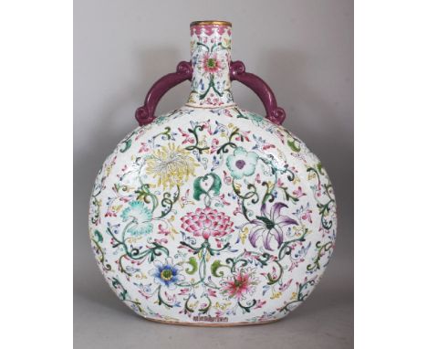 A LARGE 20TH CENTURY CHINESE SGRAFFITO GROUND FAMILLE ROSE PORCELAIN MOON FLASK, the foot with an extended Qianlong seal mark