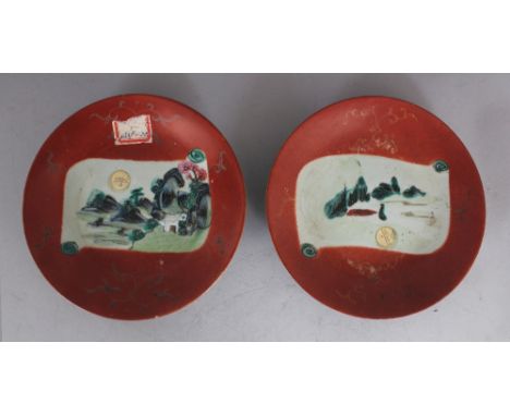 TWO 19TH CENTURY CHINESE FAMILLE ROSE PROVINCIAL PORCELAIN DISHES, each painted with a scroll-form river landscape panel rese