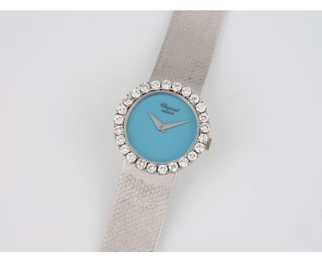 ARMBANDUHR 'CHOPARD GENEVE'Schweiz, 20. Jh.Automatik. Weißgold, gest. 0,750. L. 18 cm, D. 2,6 cm. Ges.-Gew.: 58 g. Mit Origin