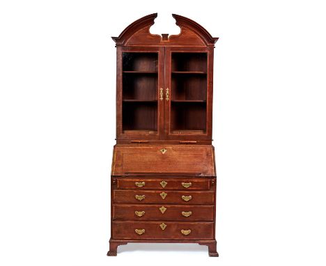 A fine George II walnut crossbanded mahogany bureau cabinet, circa 1740, with original engraved brass hardware throughout. Th