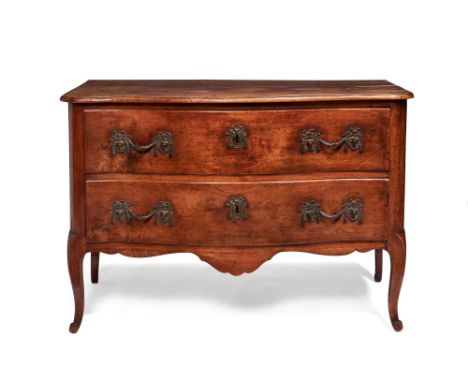 A French fruitwood commode, mid 18th century, attributed to Jean-François Hache, of serpentine outline, with two long drawers