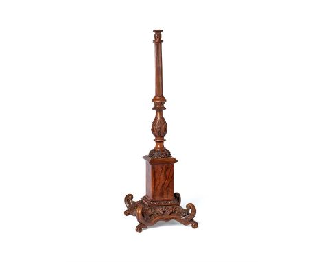 A stained hardwood table lamp base, possibly Anglo-Indian, early 20th century, the reeded stem above a foliate baluster desce