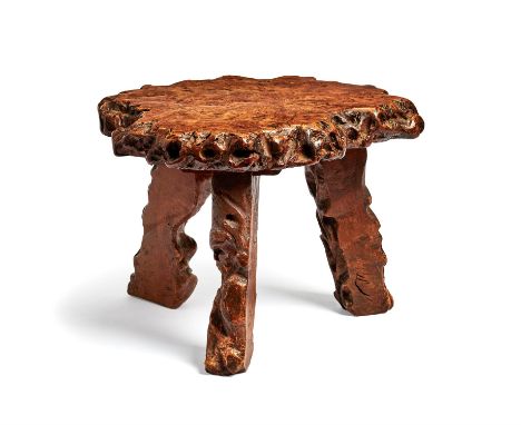 A burr elm stool, mid 20th century, of sectional tree trunk form, 31cm high, the top approximately 43 x 38cm  Condition Repor