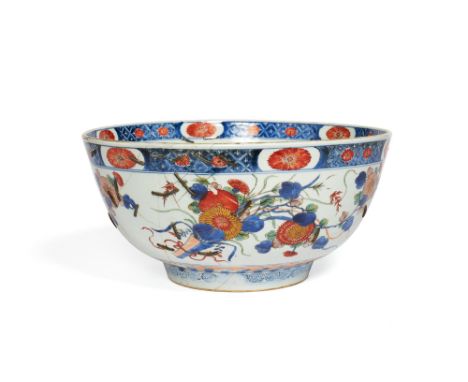 A large Chinese Imari bowl, Kangxi, 40cm diameter  Condition Report: Extensive damage and riveted repairs Condition Report Di