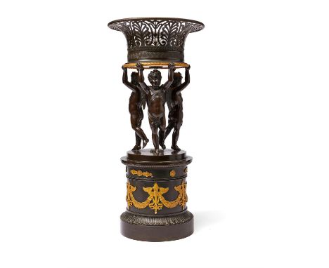 A fine Empire ormolu and patinated bronze centrepiece attributed to Pierre-François Feuchère, circa 1815, the pierced palmett