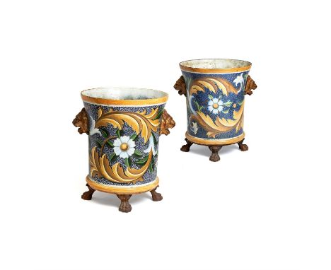 A matched pair of fine French enamelled cast iron jardinieres by E. Paris & Cie, circa 1880, the cobalt vermicular grounds en