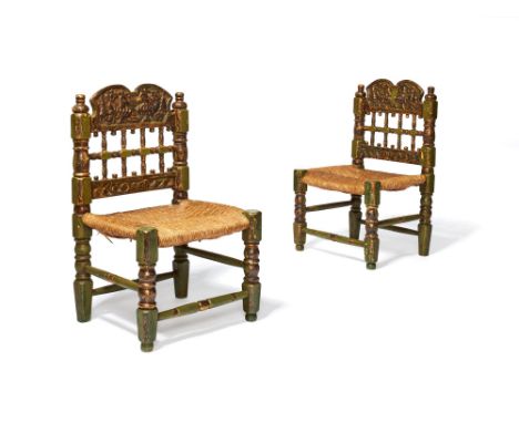 A pair of Spanish green painted and parcel giltwood side chairs, late 18th century, each with double domed cresting rail with