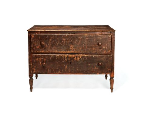 An Italian red painted wood commode, circa 1720, the rectangular top with moulded edge above two drawers each with a turned h