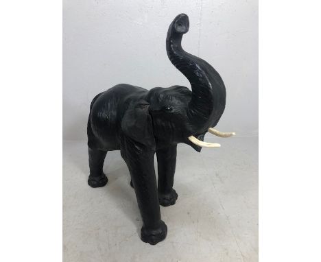 Liberty style leather elephant of large size, with earlier composite tusks (not plastic) traditional upright swept back trunk